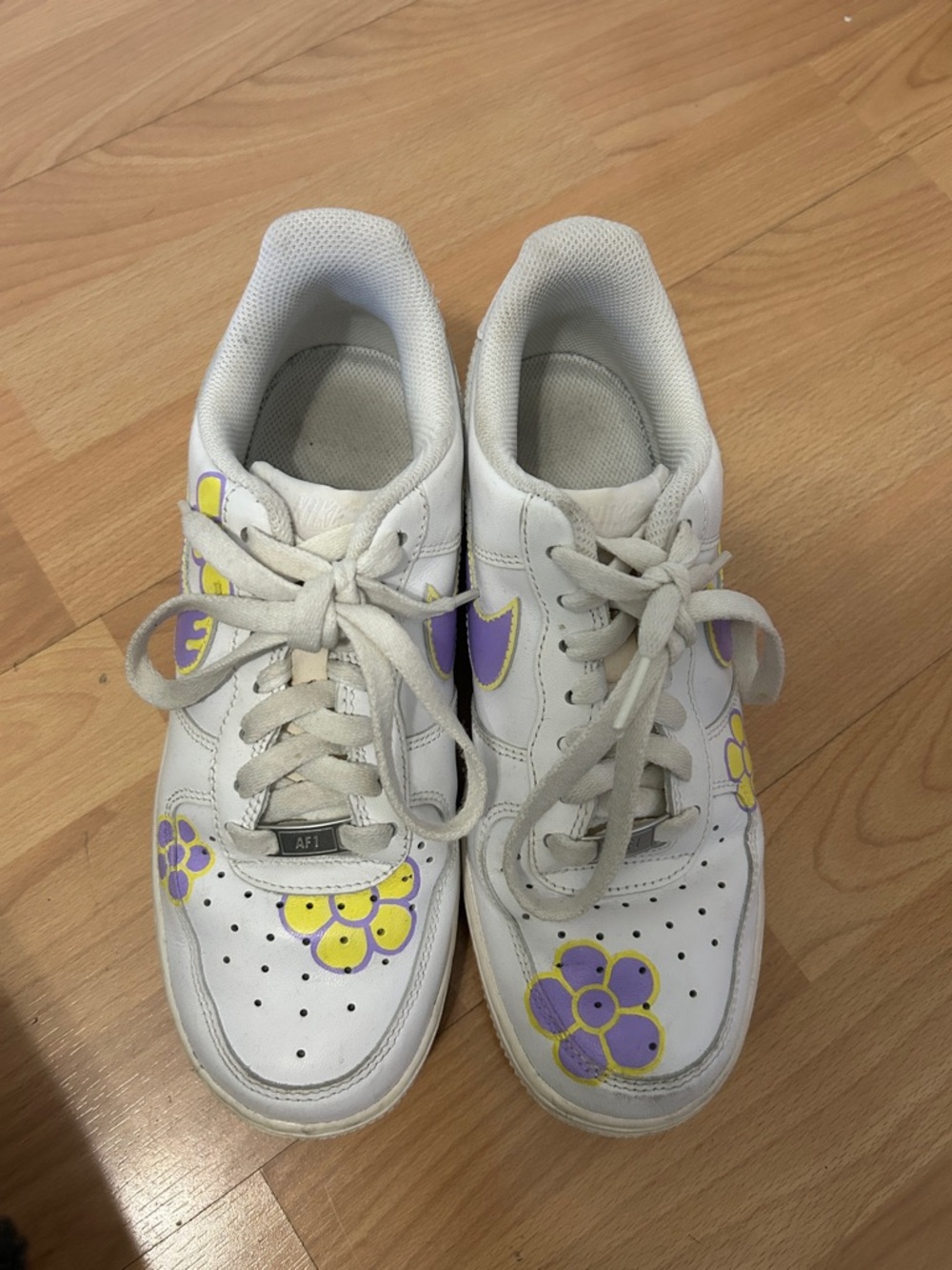 Nike Air womenSneakers with Purple & Yellow Floral Accents
